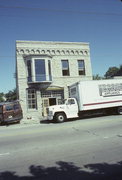 128 E ST PAUL AVE, a Commercial Vernacular blacksmith shop, built in Waukesha, Wisconsin in 1892.