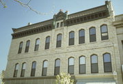 301 W MAIN ST/ 816 N GRAND, a Italianate retail building, built in Waukesha, Wisconsin in 1882.