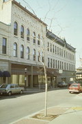 301 W MAIN ST/ 816 N GRAND, a Italianate large retail building, built in Waukesha, Wisconsin in 1882.