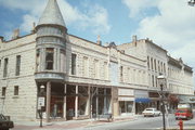 802 N GRAND AVE, a Queen Anne large retail building, built in Waukesha, Wisconsin in 1891.
