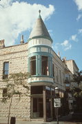 802 N GRAND AVE, a Queen Anne retail building, built in Waukesha, Wisconsin in 1891.