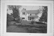 N56 W25236 RICHMOND ROAD, 1000 FEET WEST OF HIGHWAY J, NORTH SIDE, a Gabled Ell house, built in Lisbon, Wisconsin in 1890.