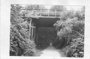 6TH St. over C&NW rail line, a NA (unknown or not a building) wood bridge, built in Mount Horeb, Wisconsin in 1914.