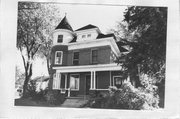 409 E MAIN ST, a Queen Anne house, built in Mount Horeb, Wisconsin in 1895.