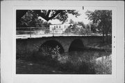 ROOSEVELT DR OVER THE MENOMONEE RIVER, a NA (unknown or not a building) stone arch bridge, built in Menomonee Falls, Wisconsin in 1899.