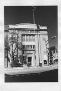 138 E MAIN ST, a Neoclassical/Beaux Arts bank/financial institution, built in Mount Horeb, Wisconsin in 1924.