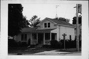 501 JEFFERSON ST, a Greek Revival house, built in Mukwonago (village), Wisconsin in 1860.