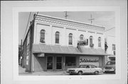 126-128 S SILVER LAKE ST, a Commercial Vernacular large retail building, built in Oconomowoc, Wisconsin in 1885.