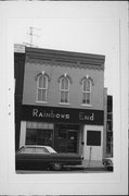 141 E WISCONSIN AVE, a Italianate small retail building, built in Oconomowoc, Wisconsin in 1884.