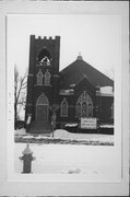 301 W WISCONSIN AVE, a Late Gothic Revival house of worship, built in Oconomowoc, Wisconsin in 1912.