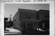 210 OAKTON AVE, a Commercial Vernacular small retail building, built in Pewaukee, Wisconsin in 1900.
