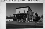 215 OAKTON AVE, a Commercial Vernacular retail building, built in Pewaukee, Wisconsin in 1900.