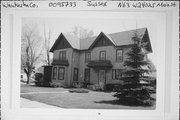 N63 W24025 MAIN ST, a Gabled Ell house, built in Sussex, Wisconsin in 1875.