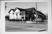 N64 W23246 MAIN ST, a Gabled Ell lodging-hotel, built in Sussex, Wisconsin in 1888.
