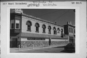 357 W BROADWAY AVE, a Romanesque Revival post office, built in Waukesha, Wisconsin in 1860.