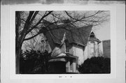 407 N GRAND AVE, a Early Gothic Revival house, built in Waukesha, Wisconsin in 1874.