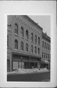 816 N GRAND AVE, a Italianate large retail building, built in Waukesha, Wisconsin in 1870.