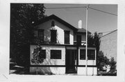 210 N HAMILTON, a Gabled Ell house, built in Madison, Wisconsin in 1858.