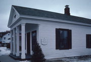 202 E UNION ST, a Greek Revival small office building, built in Waupaca, Wisconsin in 1853.