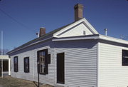 202 E UNION ST, a Greek Revival small office building, built in Waupaca, Wisconsin in 1853.