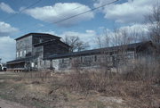 213 S OBORN ST, a Astylistic Utilitarian Building mill, built in Waupaca, Wisconsin in 1884.