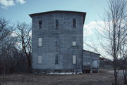 213 S OBORN ST, a Astylistic Utilitarian Building mill, built in Waupaca, Wisconsin in 1884.