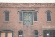115-117 E FULTON ST, a Italianate industrial building, built in Waupaca, Wisconsin in 1868.