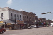 101-103 N MAIN ST, a Italianate large retail building, built in Waupaca, Wisconsin in 1878.
