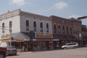 101-103 N MAIN ST, a Italianate large retail building, built in Waupaca, Wisconsin in 1878.