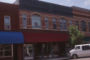 119-121 N MAIN ST 119-121 N MAIN ST, a Commercial Vernacular large retail building, built in Waupaca, Wisconsin in 1885.