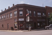 201 N MAIN ST, a Twentieth Century Commercial retail building, built in Waupaca, Wisconsin in 1913.