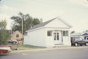 215 JEFFERSON ST, a Greek Revival bank/financial institution, built in Waupaca, Wisconsin in 1862.