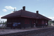 OAK ST, JUST NORTH OF RAILROAD VIADUCT, a Neoclassical/Beaux Arts depot, built in Waupaca, Wisconsin in 1907.