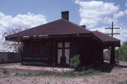 OAK ST, JUST NORTH OF RAILROAD VIADUCT, a Neoclassical/Beaux Arts depot, built in Waupaca, Wisconsin in 1907.