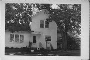 N2027 CLEGHORN ST, a Gabled Ell house, built in Dayton, Wisconsin in 1857.
