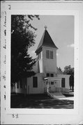 STATE HIGHWAY HIGHWAY 22 AND GRANDVIEW, a Queen Anne church, built in Farmington, Wisconsin in 1890.