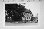 203 W BEACON AVE, a Queen Anne house, built in New London, Wisconsin in 1860.