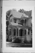 415 GRANITE ST, a Queen Anne house, built in Waupaca, Wisconsin in 1899.