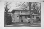 217 E LAKE ST, a American Foursquare house, built in Waupaca, Wisconsin in 1915.