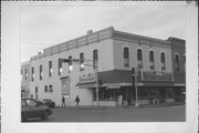 101-103 N MAIN ST, a Italianate large retail building, built in Waupaca, Wisconsin in 1878.