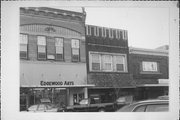 111 N MAIN ST, a Commercial Vernacular small retail building, built in Waupaca, Wisconsin in 1878.