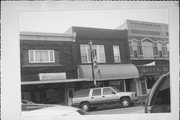 115 N MAIN ST, a Commercial Vernacular small retail building, built in Waupaca, Wisconsin in 1881.