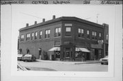 201 N MAIN ST, a Twentieth Century Commercial retail building, built in Waupaca, Wisconsin in 1913.