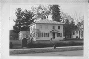 618 S MAIN ST, a Two Story Cube house, built in Waupaca, Wisconsin in 1870.
