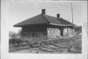 OAK ST, JUST NORTH OF RAILROAD VIADUCT, a Neoclassical/Beaux Arts depot, built in Waupaca, Wisconsin in 1907.
