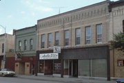 219 MAIN ST, a Queen Anne retail building, built in Menasha, Wisconsin in .