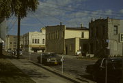 132-134 W WISCONSIN AVE, a Commercial Vernacular large retail building, built in Neenah, Wisconsin in 1856.