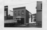 211 KING ST, a Commercial Vernacular small retail building, built in Madison, Wisconsin in 1869.