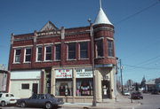 1124-1128 OREGON ST, a Queen Anne small retail building, built in Oshkosh, Wisconsin in 1894.