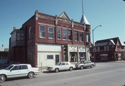 1124-1128 OREGON ST, a Queen Anne retail building, built in Oshkosh, Wisconsin in 1894.